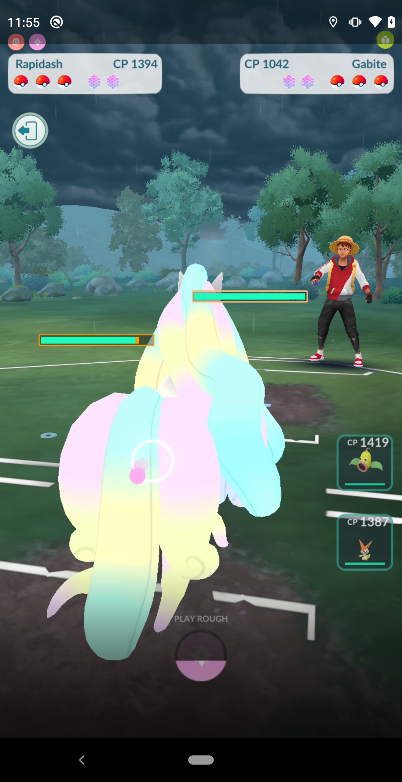 Physical device running automated Pokémon GO Battle League combat sequence
